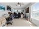 Bright home office with natural light and multiple desk setups at 9047 Apache Plume Dr # D, Parker, CO 80134