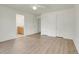 Spacious bedroom featuring hardwood floors and access to an en-suite bathroom at 1311 S Kingston St, Aurora, CO 80012