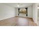 Large bedroom with hardwood floors, ceiling fan and a big window at 1311 S Kingston St, Aurora, CO 80012