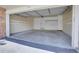 Spacious two-car garage with ample room for parking and storage, featuring a white interior and overhead door at 1311 S Kingston St, Aurora, CO 80012