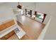 Aerial view of the living room, windows with curtains, and the kitchen at 1311 S Kingston St, Aurora, CO 80012
