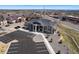 Aerial view of the apartment building, ample parking and surrounding neighborhood at 875 E 78Th Ave # 70, Denver, CO 80229