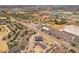 Overhead view displays the apartment complex in proximity to nearby retail areas and residential neighborhoods at 875 E 78Th Ave # 70, Denver, CO 80229