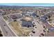 A wide aerial view of the property showcasing the neighborhood, nearby streets, and local businesses at 875 E 78Th Ave # 70, Denver, CO 80229
