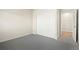 Carpeted bedroom with double closets and neutral colored paint at 875 E 78Th Ave # 70, Denver, CO 80229