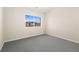 Spare bedroom features natural light and neutral paint at 875 E 78Th Ave # 70, Denver, CO 80229