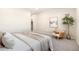 Bedroom with soft lighting and neutral colors featuring a sitting area, soft decor, and carpeted floors at 875 E 78Th Ave # 70, Denver, CO 80229
