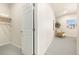 View from closet to bedroom featuring a closet, natural light, and neutral colors at 875 E 78Th Ave # 70, Denver, CO 80229