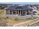 Lovely apartment building featuring stone accents, balconies, and a xeriscaped front yard at 875 E 78Th Ave # 70, Denver, CO 80229