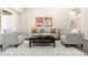 Inviting living room featuring stylish decor, neutral colors, modern furnishings, and abundant natural light at 875 E 78Th Ave # 70, Denver, CO 80229