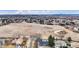 An aerial view of a cozy property located in a neighborhood near a field and modern highway at 6680 E Rustic Dr, Parker, CO 80138
