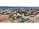 A tranquil aerial perspective of the property nestled among a residential area, close to city amenities at 6680 E Rustic Dr, Parker, CO 80138