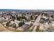 A beautiful aerial view showcases a property's proximity to the highway, town, and suburban area at 6680 E Rustic Dr, Parker, CO 80138