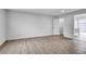 Bright bedroom with wood-look floors and ample closet space at 6680 E Rustic Dr, Parker, CO 80138