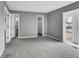 This bedroom offers neutral carpeting, closet space, and natural light at 6680 E Rustic Dr, Parker, CO 80138