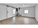 Versatile bonus room with stylish sliding barn doors and neutral decor at 6680 E Rustic Dr, Parker, CO 80138