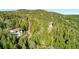 Secluded home nestled among trees on a mountainside, offering a private retreat at 33090 Janelle Cir, Golden, CO 80403