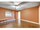 Cozy bedroom featuring a small desk, ceiling fan, and ample natural light at 33090 Janelle Cir, Golden, CO 80403