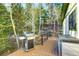 Grill and deck box on deck with forest views at 33090 Janelle Cir, Golden, CO 80403