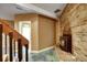Living room featuring a brick fireplace and staircase at 33090 Janelle Cir, Golden, CO 80403