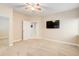 Bedroom featuring neutral walls, carpeted floors, a ceiling fan, and natural light at 12513 Grape St, Thornton, CO 80241