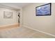 Bonus room featuring plush carpeting and fresh paint at 12513 Grape St, Thornton, CO 80241