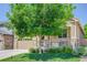 Beautiful two-story home with a well-manicured lawn and a cozy front porch at 12513 Grape St, Thornton, CO 80241