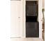 Laundry closet with stackable washer and dryer at 19738 Applewood Ct, Parker, CO 80138