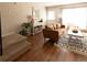 Comfortable living room boasts hardwood floors, stylish furnishings, and bright lighting at 19738 Applewood Ct, Parker, CO 80138