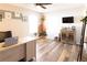 Office space featuring a desk, seating, plants, and a television at 19738 Applewood Ct, Parker, CO 80138