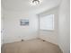 This well-lit bedroom provides a comfortable and versatile space for relaxation at 535 High Point Dr, Golden, CO 80403
