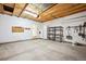 Large garage with storage and overhead door at 535 High Point Dr, Golden, CO 80403