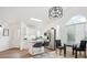 Bright open living and kitchen space with stainless steel appliances and modern finishes at 535 High Point Dr, Golden, CO 80403