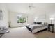 Spacious main bedroom with large windows offering scenic views and plenty of natural light at 535 High Point Dr, Golden, CO 80403