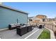 Backyard patio with outdoor furniture and a cozy seating area at 8733 Arriba Dr, Littleton, CO 80125