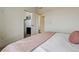 Bedroom with a closet and light pink accents at 8733 Arriba Dr, Littleton, CO 80125