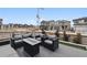 This home has a cozy deck area with comfortable seating and a beautiful view of the community at 8733 Arriba Dr, Littleton, CO 80125
