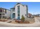 Stylish two-story home boasts modern design with attractive siding and well-maintained landscaping at 8733 Arriba Dr, Littleton, CO 80125