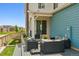 Back patio seating area that offers a relaxing retreat for casual outdoor living at 8733 Arriba Dr, Littleton, CO 80125
