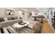 Finished basement with stylish furniture and a pool table at 15376 Ivanhoe Ct, Thornton, CO 80602