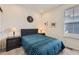 Bedroom with gray carpet, window with blinds and side tables at 15376 Ivanhoe Ct, Thornton, CO 80602