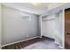Finished basement room with carpet flooring, closet, and window at 16588 E 8Th Ave, Aurora, CO 80011