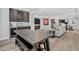Spacious basement with living area, bar, and workout equipment at 436 Sage Grouse Cir, Castle Rock, CO 80109
