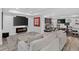 Modern basement with entertainment area and workout equipment at 436 Sage Grouse Cir, Castle Rock, CO 80109