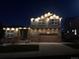 Home decorated with festive lighting, showcasing a welcoming facade at night at 436 Sage Grouse Cir, Castle Rock, CO 80109