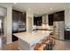 Modern kitchen with stainless appliances, granite counters, and ample cabinet space at 436 Sage Grouse Cir, Castle Rock, CO 80109