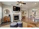 Stylish living space showcases a fireplace, TV, and decor; blending comfort and elegance at 436 Sage Grouse Cir, Castle Rock, CO 80109
