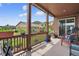 Covered patio overlooking landscaped backyard at 436 Sage Grouse Cir, Castle Rock, CO 80109