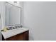 Chic powder room with stylish vanity and modern fixtures at 436 Sage Grouse Cir, Castle Rock, CO 80109