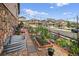 Inviting side yard featuring garden beds, stone paths, string lights, and privacy fencing for outdoor enjoyment at 436 Sage Grouse Cir, Castle Rock, CO 80109